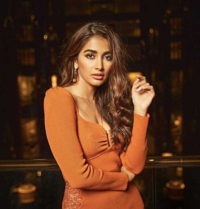 Pooja Hegde flaunt her beauty in her thigh high slit orange dress ...